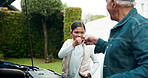 Grandfather, fist bump and teaching girl with car for maintenance, mechanical service or cleaning at home. Grandpa and grandchild with special handshake for vehicle repair or inspection at house