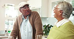 Happy, senior couple and wine with drinking in house for connection, laugh and memory as partner. Elderly people, talking and kitchen for bonding, relationship and together in home for health or love