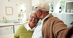 Happy, elderly couple and selfie with forehead kiss for connection, celebration or memory as partner. Senior people, hug and kitchen for bonding, relationship and together in home for support or love