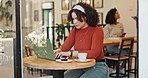 Woman, laptop and freelancer in coffee shop for remote work, social networking and internet research. Email, copy writer and website content or press release project in restaurant, reading and busy