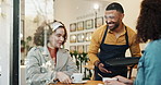 Friends, waiter and hospitality in coffee shop for morning, together and service in city. Women, smile and server in cafe for career, small business or reunion and smile for man or latte in New York