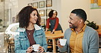 Coffee, conversation and people in restaurant for first date bonding together with flirting connection. Happy, talking and young man and woman drink cappuccino at cafe in morning for romantic meeting