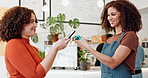 Phone, woman and mobile payment in cafe for machine and financial transaction with banking account. Smartphone, customer and waiter at pos in store with fintech for sale, food or nfc tap as exchange