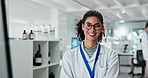 Portrait, science and woman typing on computer for research, study chemistry and biotechnology. Face, happy scientist and doctor in glasses on tech for healthcare innovation, test or lab experiment