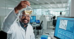 Science, computer and black man with beaker in lab for inspection, research and medical assessment. Mature scientist, graphs and glass container by screen for chemistry, particle study and innovation