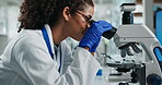 Woman, microscope and sample analysis in laboratory, research and live cell imaging with immunologist for study. Record, microbial data and innovation investigation, virus specimen and scientist
