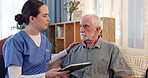 Caregiver, senior man and conversation with tablet for medication management, health monitoring and tracking. Female nurse, elderly person and technology in retirement home for medicare planning.