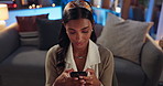 House, typing and Indian woman with smartphone, texting and scrolling for contact, social media and internet. Person, mobile user or girl with cellphone, network and online reading for ebook or relax