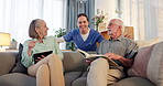 Smile, caregiver and hug elderly couple at retirement home for support, healthcare and wellness of medical help. Happy, nurse and people relax on sofa for care, embrace and recovery in living room

