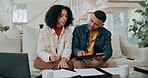 Finance, documents and couple on sofa in discussion for monthly bills, checklist or budget in living room. Home, paperwork and stressed woman with man for tax review, accounting or asset management