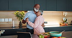 Dancing, love and senior couple in kitchen with romance to music, radio or song at home. Care, connection and elderly man and woman embracing for groove and cooking dinner meal at apartment together.