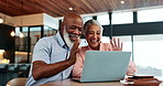 Senior couple, video call and wave on laptop for talking, conversation and communication. Interracial, happy man and woman on computer for virtual chat, hello and greeting online in retirement home