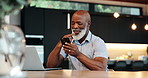 Search, phone or senior black man on social media for travel choice or website notification in home. Smile, thinking or mature person texting on networking mobile app chat or reading news to relax