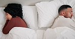 Conflict, sleeping and couple in bed for argument, disagreement or relationship problem in bedroom. Top view, pillow and tired woman with man for misunderstanding, ignoring or exhausted in home