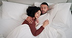 Relax, sleeping and couple with hug in bed for rest, blanket and cozy morning in bedroom. Top view, love and tired man with woman on lazy weekend for dreaming, fatigue or comfortable break in home