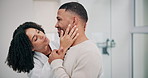 Bathroom, couple and care with support in home, wellness and love with hug in marriage with embrace. Happy people, woman and man for morning routine, grooming and bonding together in modern house