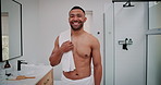 Shirtless man, face and happiness in bathroom for morning routine or wellness, pride for healthy body. Topless, male person and smile for hygiene in house with towel, clean shower or self care