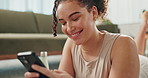 Woman, online and phone for pilates break in home, texting and app for conversation on floor. Female person, self care and rest from exercise or workout challenge, social media and scroll on internet