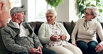 Couch, woman and elderly friends in conversation in living room together for speaking, diversity and bonding. Nursing home, retirement and senior people in discussion and talking to relax on sofa