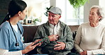 Senior, couple and nurse healthcare with tablet, patient and health issue or explanation or people on sofa. Caregiver, consultation and advice or cardio problem, retirement home and medical or report