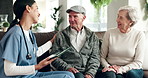 Senior, couple and nurse health care or tablet, patient and satisfied with treatment diagnosis or people on sofa. Caregiver, consultation and advice in retirement home, medical and happy for report