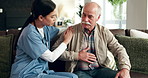 Home, nurse and old man on sofa, consultation and conversation for heart rate, checkup and advice. Apartment, caregiver and senior patient on couch, medical and help with professional and cardiology 