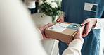 Package, hands and nurse with delivery, people or parcel for medicare, cardboard and shipping. Closeup, professional or employee with box, logistics or first aid with friendly service and medical