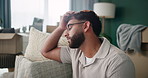 Man, new home and stress on sofa with boxes, anxiety and fear in lounge for fail, mistake or eviction. Young guy, sad and frustrated thinking for plan, rent payment or moving out of apartment