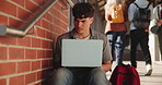 Campus, internet and man with laptop at university for communication, information and research. Scholarship, student and confused with tech for exam grades, education and mistake in online results