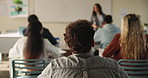 Student, teenager and learning in classroom from teacher for education, growth and development with lesson. People, listening and study with back in high school for lecture, presentation or exam tips