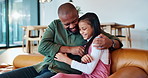 Hug, tickle or father and daughter on sofa with love, comfort or safety, trust and bonding at home together. Happy family, games and kid playing with parent in living room with laughter, care or fun