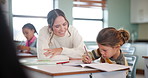 Teacher, student and classroom for education at school with learning support, knowledge and helping of mentorship. Girl, woman and paper for lesson activity, assessment and studying advice of growth