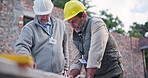 Contractors, talk and meeting for project in house, design plan and collaboration on construction site. People, engineers and speaking for inspection of infrastructure, renovation and team for build