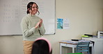 Teacher, education and applause in classroom for learning, development and growth as youth with math. Woman, children and clapping in kindergarten or elementary school for knowledge, study and idea