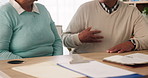 Senior, couple and documents in office with lawyer for legal consultation, will writing and power of attorney for estate. People, talking and paperwork for trust establishment and retirement planning