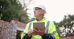 Architecture, mature man and tablet for inspection, quality control and maintenance. Building site, male architect and digital for record info, project management and typing report in construction