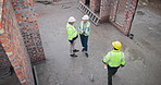 Contractor, construction and builder site with walking, engineer professional and group with top view. Planning, blueprint and contractor inspection team outdoor with maintenance talk for project