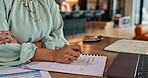 Woman, writing and paperwork with laptop at house for budget planning, financial account and pension fund. Person, documents and investment application, asset management and future insurance growth