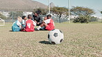 Coach, team and motivation talk for soccer, junior league and teamwork competition or training on football field. People, children and coaching for outside exercise, match strategy and kids together
