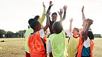 Football, hands and coach with children for celebration, motivation and team spirit for sport competition. Soccer field, applause and trainer with players for win, achievement and confidence boost