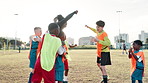 Football, hands and coach with children for success, celebration and team spirit for sport competition. Soccer field, applause and trainer with players for win, achievement and confidence boost