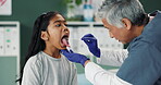 Depressor, kid and doctor check mouth for wellness, test or healthcare of people in medical hospital. Child, ent pediatrician or throat exam of girl for tongue, tonsils or otolaryngology with patient