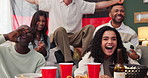 Friends, watching tv and celebrate winning soccer, sport and support team with German flag. Television, football or group of excited people clap for world cup competition, goal and diversity at home