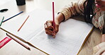 Letters, child and hand on desk, pencil and closeup of education, notebook and student in middle school. Classroom, studying and practice for exam, growth and development of kid, writing and table