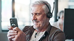 Customer support, relax and man with phone in office for internet, website and social media. Call center, telemarketing and person with headset on smartphone for contact, chat and communication