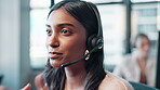 Call center, woman and headset with communication in office for crm support, assistance or advice. Smile, consulting and person with tech in discussion for b2c help, customer service or telemarketing