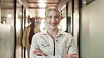 Lobby, face and happy woman with pride for business, working and ideas for company project. Office, consultant and arms crossed with smile for professional career, personal growth and job passion