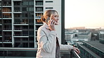 Woman, rooftop or city with talking or phone call for communication, chat in urban for business. Female consultant, mobile or employee with conversation in outdoor for networking, happy for job news