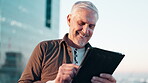 Mature, businessman and reading with tablet on rooftop in city for research and networking. Technology, smile and ceo or executive on balcony for social media, blogging and internet for online app