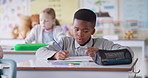 Boy, child and writing in classroom with counting, problem solving or exam for education at academy. African pupil, school kids and math notes in book for learning, scholarship and thinking for test